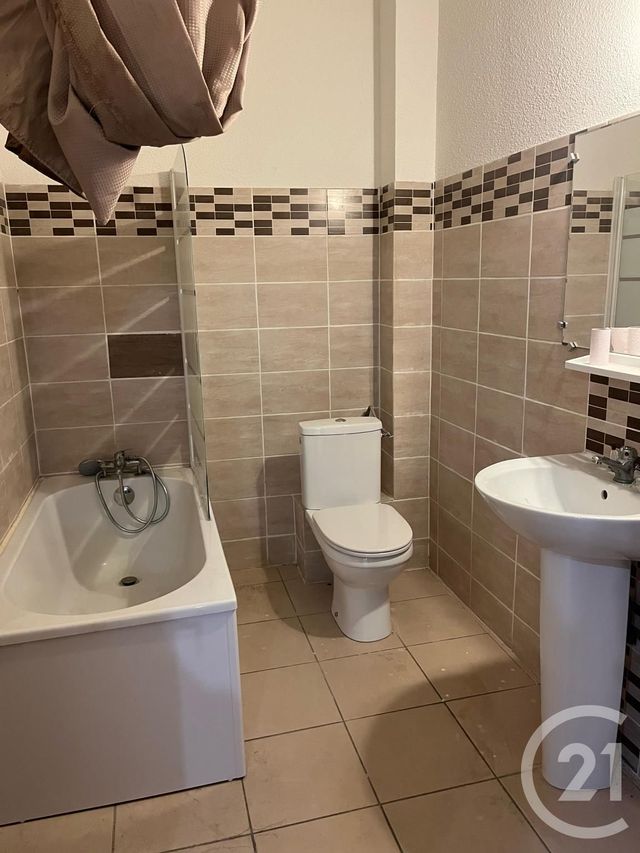 Appartement F3 à louer - 3 pièces - 86.12 m2 - SOMMIERES - 30 - LANGUEDOC-ROUSSILLON - Century 21 Jcd Immobilier