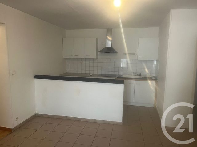 Appartement F4 à louer - 4 pièces - 61.58 m2 - SOMMIERES - 30 - LANGUEDOC-ROUSSILLON - Century 21 Jcd Immobilier