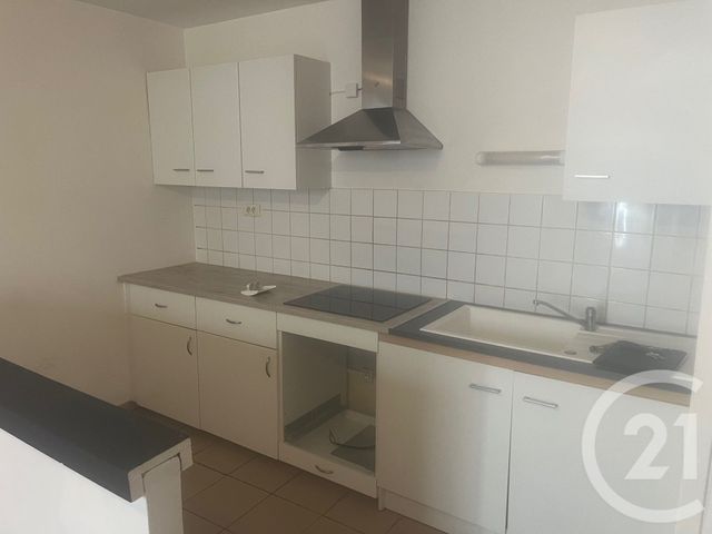 Appartement F4 à louer - 4 pièces - 61.58 m2 - SOMMIERES - 30 - LANGUEDOC-ROUSSILLON - Century 21 Jcd Immobilier