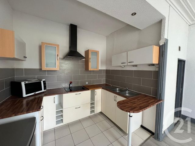 Appartement F2 à louer - 2 pièces - 55.35 m2 - SOMMIERES - 30 - LANGUEDOC-ROUSSILLON - Century 21 Jcd Immobilier
